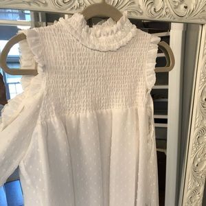 White open shoulder turtle neck blouse